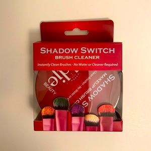 Shadow switch brush cleaner